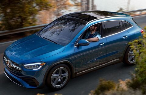 2022 MercedesBenz GLA blue side view on the road