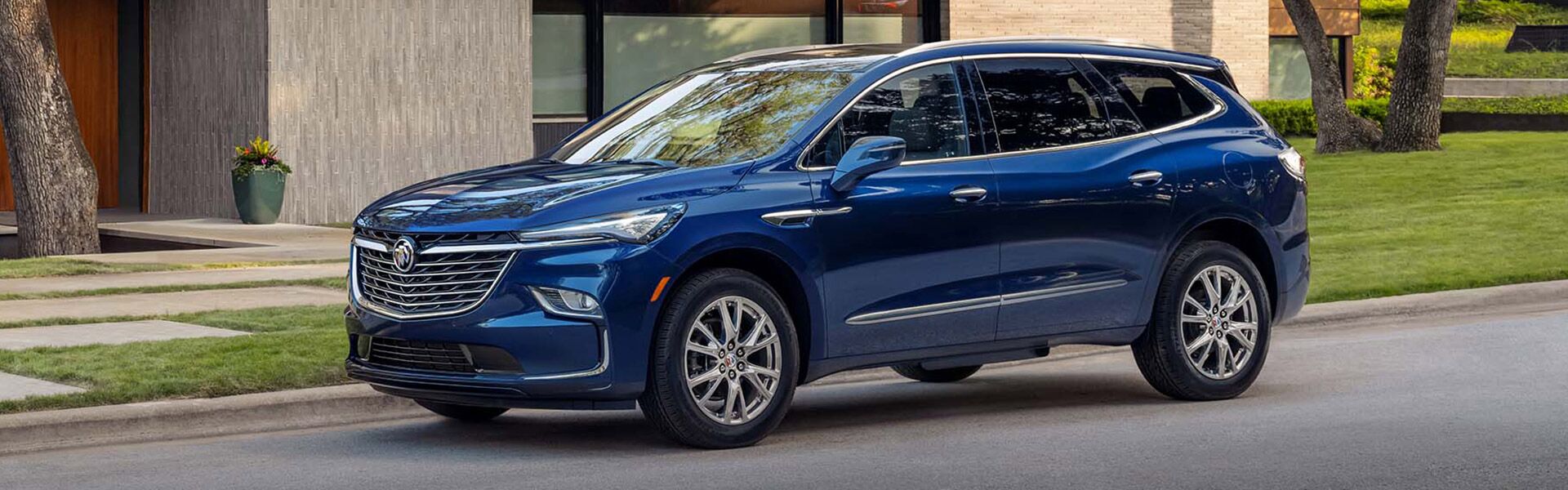 2023 Buick ENclave side view parked on a road