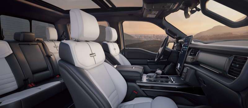 A cabin view including seating and panoramic sunroof in the 2025 Ford F-150 Lightning interior.