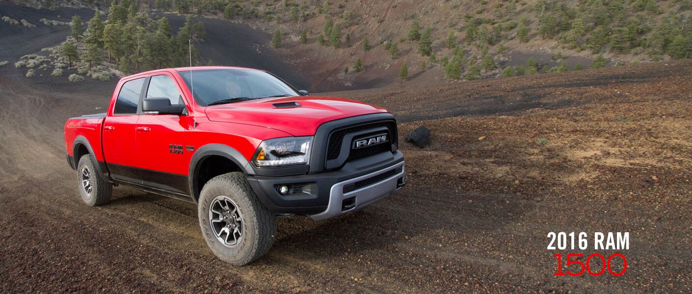 A 2016 Ram 1500 on a muddy trail