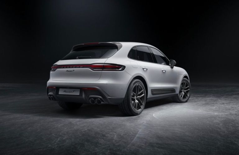 Rear side view of a white 2023 Porsche Macan T