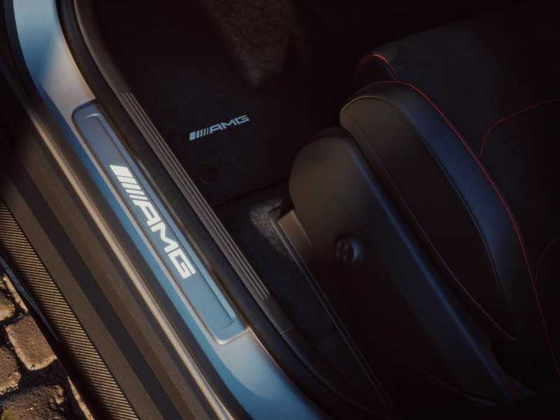 The badging on the door sill and floormats of the 2026 AMG® GLC 63 S E PERFORMANCE SUV