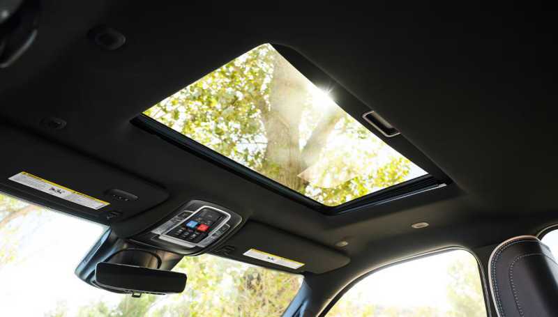 The sunroof and overhead controls in a used Dodge Ram diesel truck