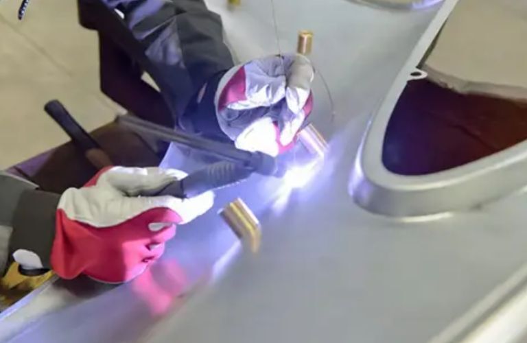 image of a technician's hands wearing gloves