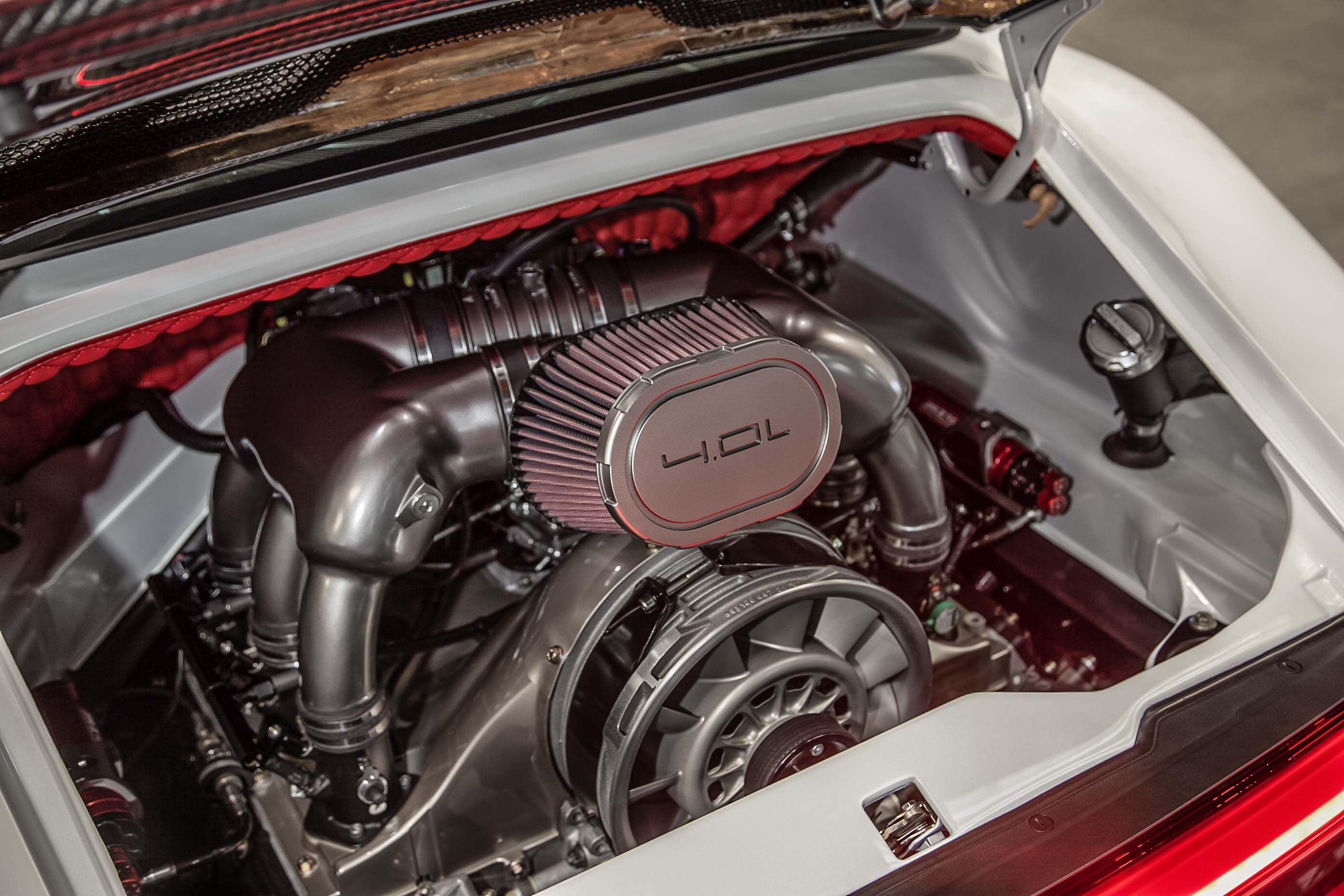 engine of a Porsche Coupe model close up