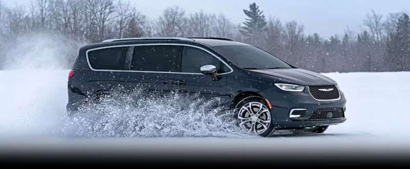 The Chrysler Pacifica with AWD driving in the snow.