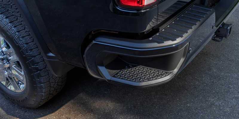 The step rear bumper of a Chevy diesel truck