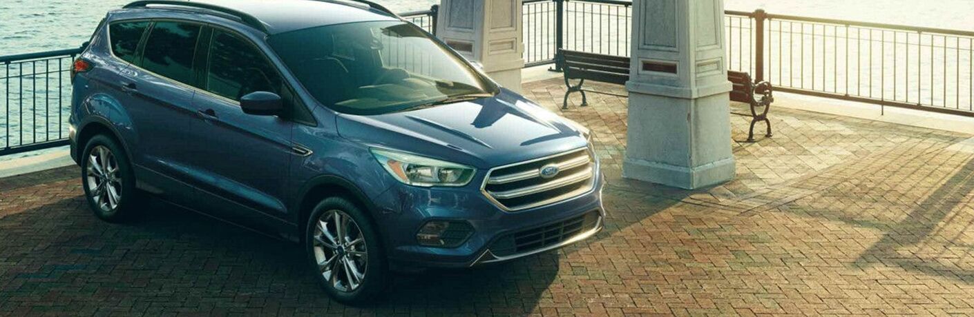 Blue Ford Escape on a patio