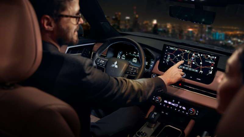 The controls and displays in a used Mitsubishi Outlander near Edmonton, AB.