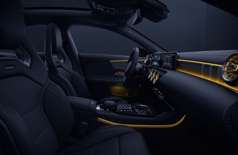 Front-row view of the 2023 Mercedes-AMG CLA 35 Coupe with yellow ambient lighting