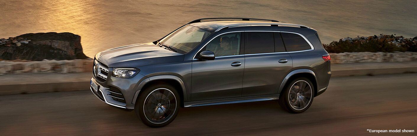 2020 MB GLS exterior front fascia and driver side on road next to ocean