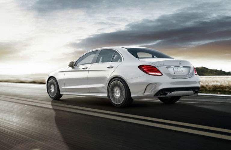 2018 Mercedes-Benz C-Class driving at sunset