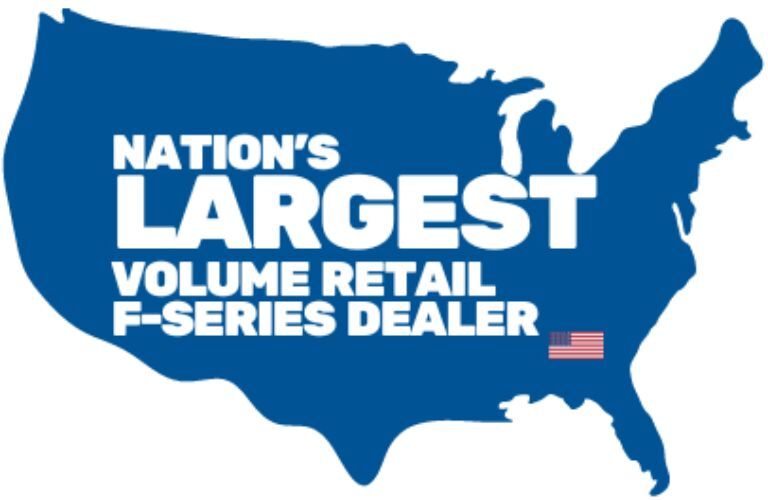 Ford F-450 inventory at Akins Ford in front of showroom