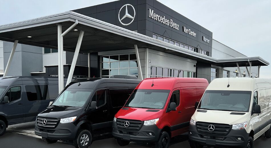 Exterior of dealership with van lineup