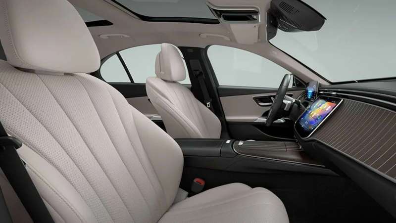 The luxurious front seats in the  2025 Mercedes-Benz E 450 4MATIC® Sedan