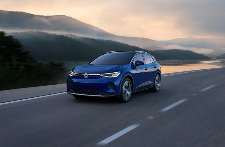 A 2022 Volkswagen ID.4 speeding on a road