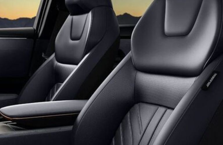 Interior seats of the Nissan Ariya is shown.