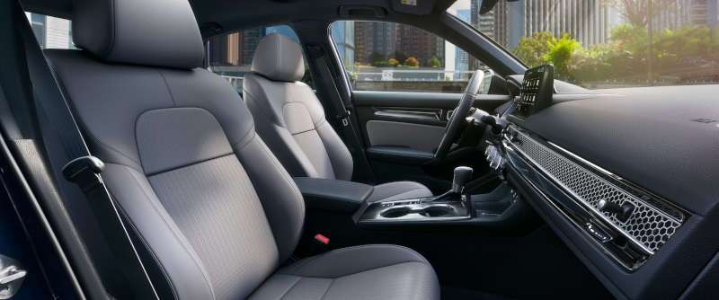The cockpit and front seating in the 2026 Honda Civic