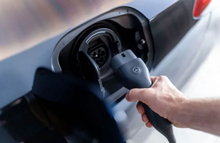 close up of a Mercedes-Benz Plug-In Hybrid being charged