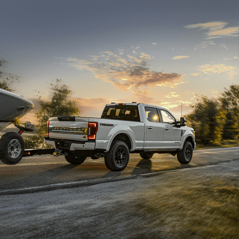 ford truck pulling a boat
