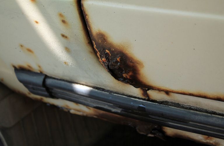 Rust damage in a car door