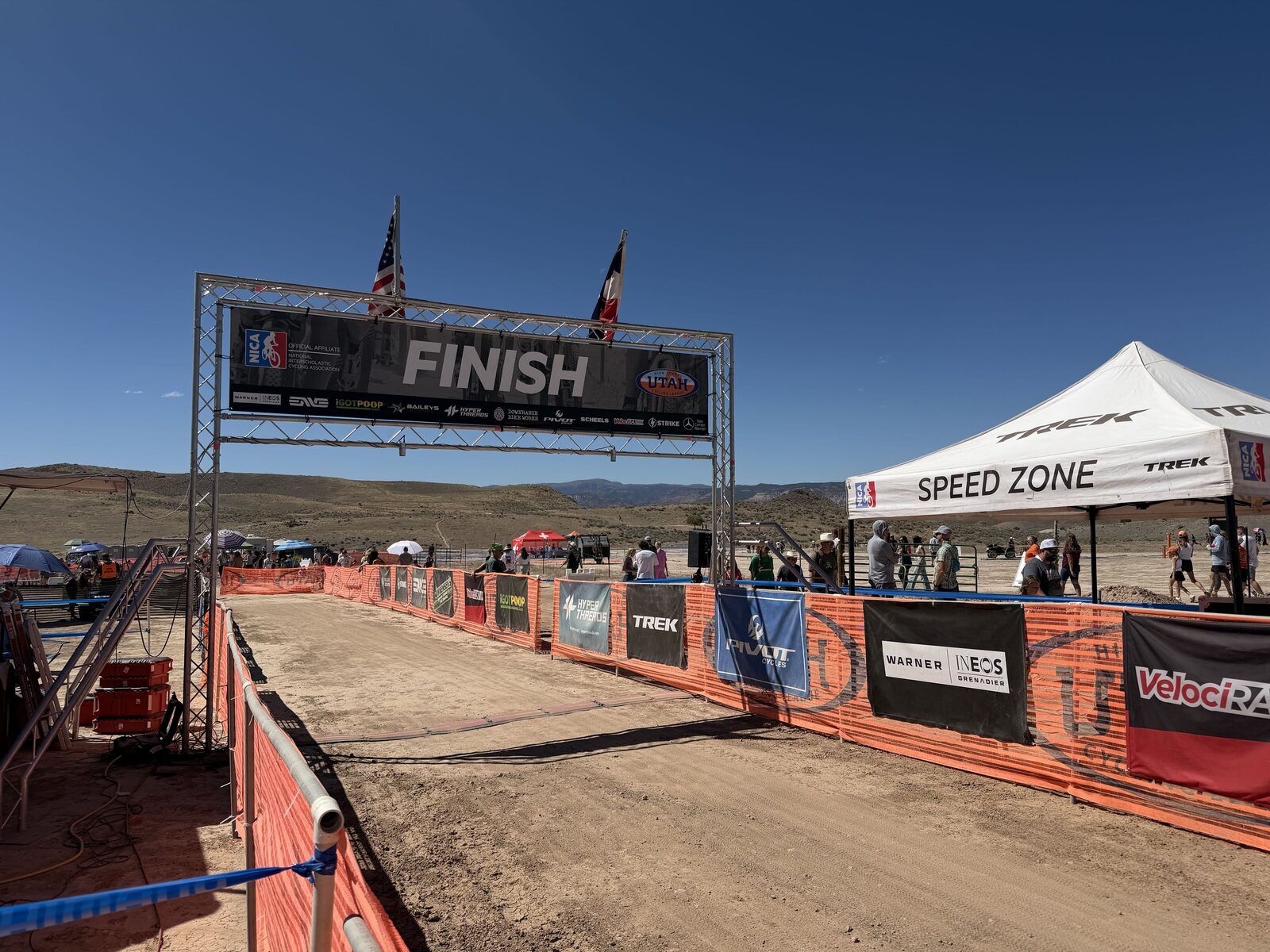 Finish line gantry with Warner INEOS Grenadier sponsor banner at the Utah High School Cycling League NICA State Championships