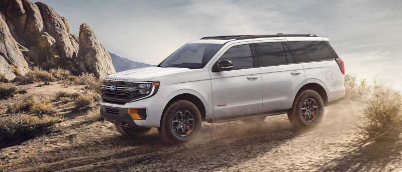 A side view of the 2027 Ford Expedition Tremor off-roading
