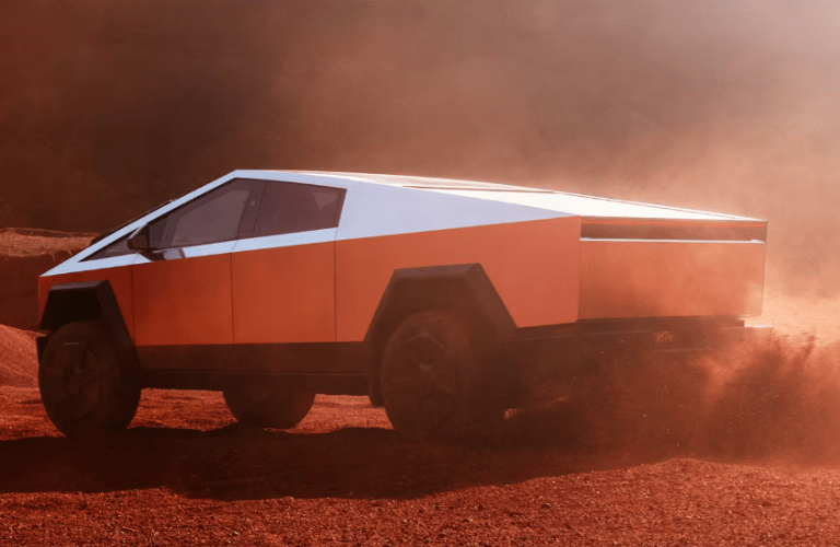 Side view of the 2024 Tesla CyberTruck in desert