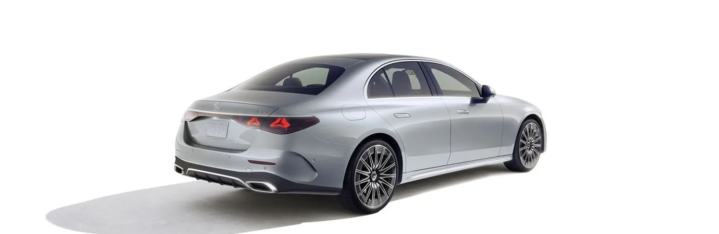 diagonal rear-view image of the 2025 Mercedes-Benz E 450 4MATIC® Sedan