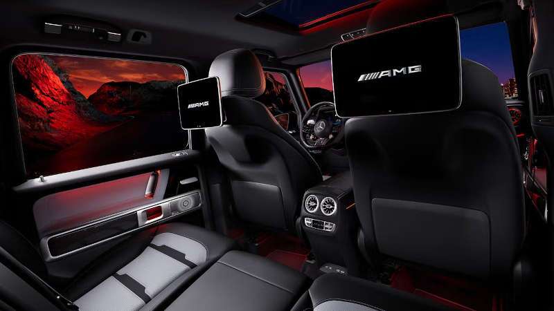 The rear seating and rear infotainment consoles in the 2025 Mercedes-Benz AMG® G 63 SUV