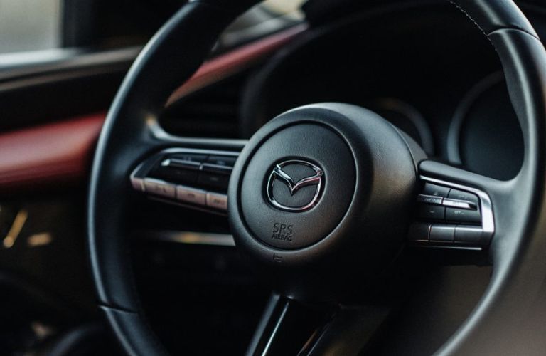 steering wheel in the 2024 Mazda3 Hatchback