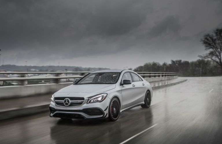 2018 MB CLA exterior front fascia and drivers side going fast on highway during rain