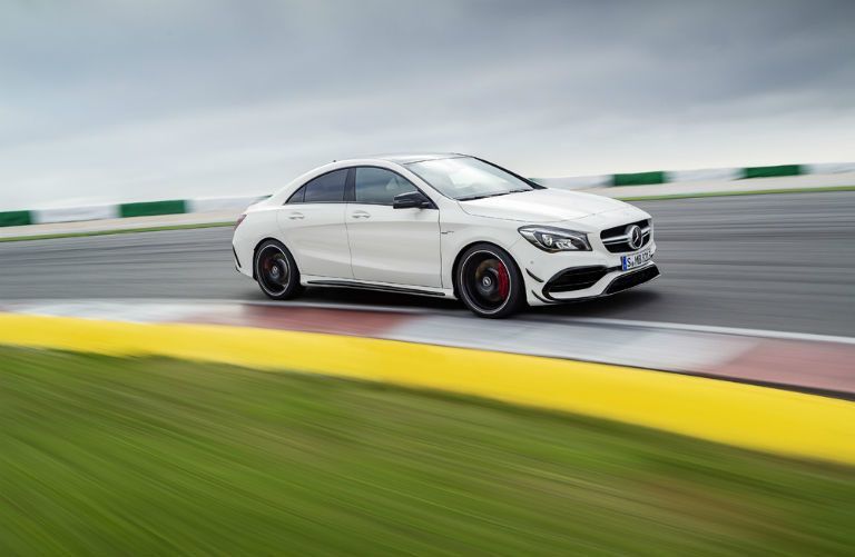 2017 Mercedes-Benz CLA driving on a race track on a cloudy day