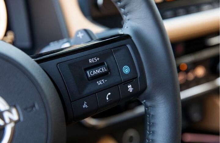 Controls on the steering wheel of a 2022 Nissan Rogue_o