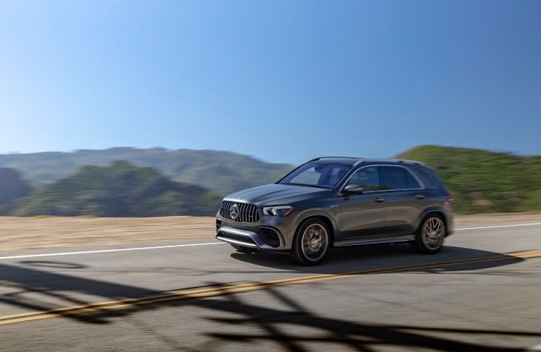 2021 MB GLE exterior front fascia driver side on empty road with hills