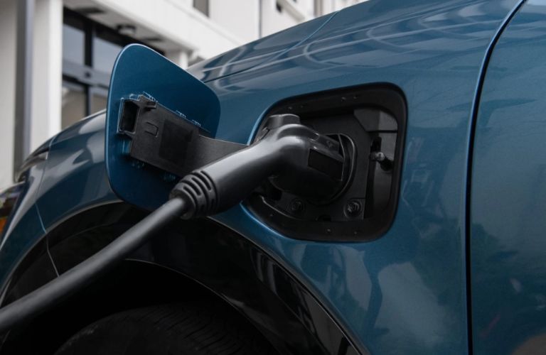 A 2024 Kia Niro Plug-In Hybrid being charged