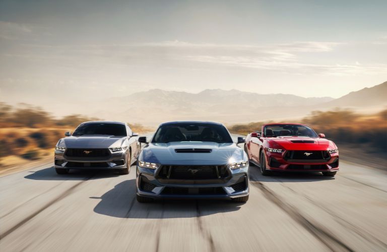 Three 2024 Ford Mustang front view