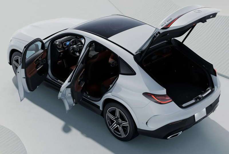 A top-down external view of the 2026 Mercedes-Benz GLC 300 4MATIC® Coupe with its doors and rear hatch open