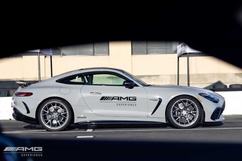 A side exterior view of one of the AMG® Experience vehicles at the Sonoma racetrack