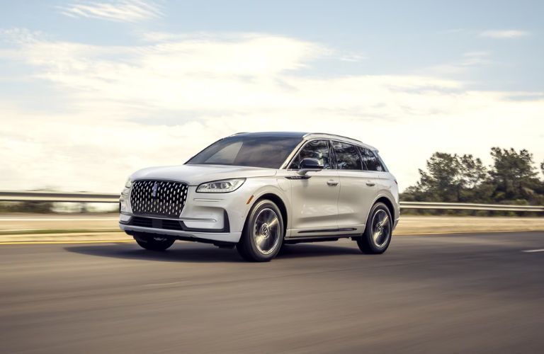 A 2024 Lincoln Corsair speeding on a road