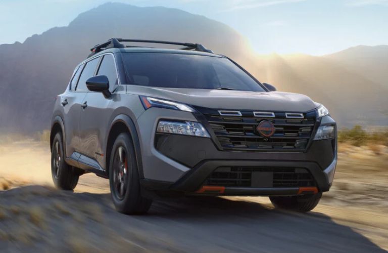 2025 Nissan Rogue side and front view