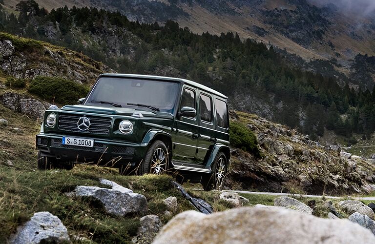 mercedes-benz g-class climbing a mountain
