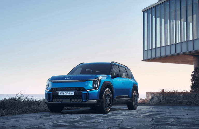 2024 Kia EV9 in front of a building