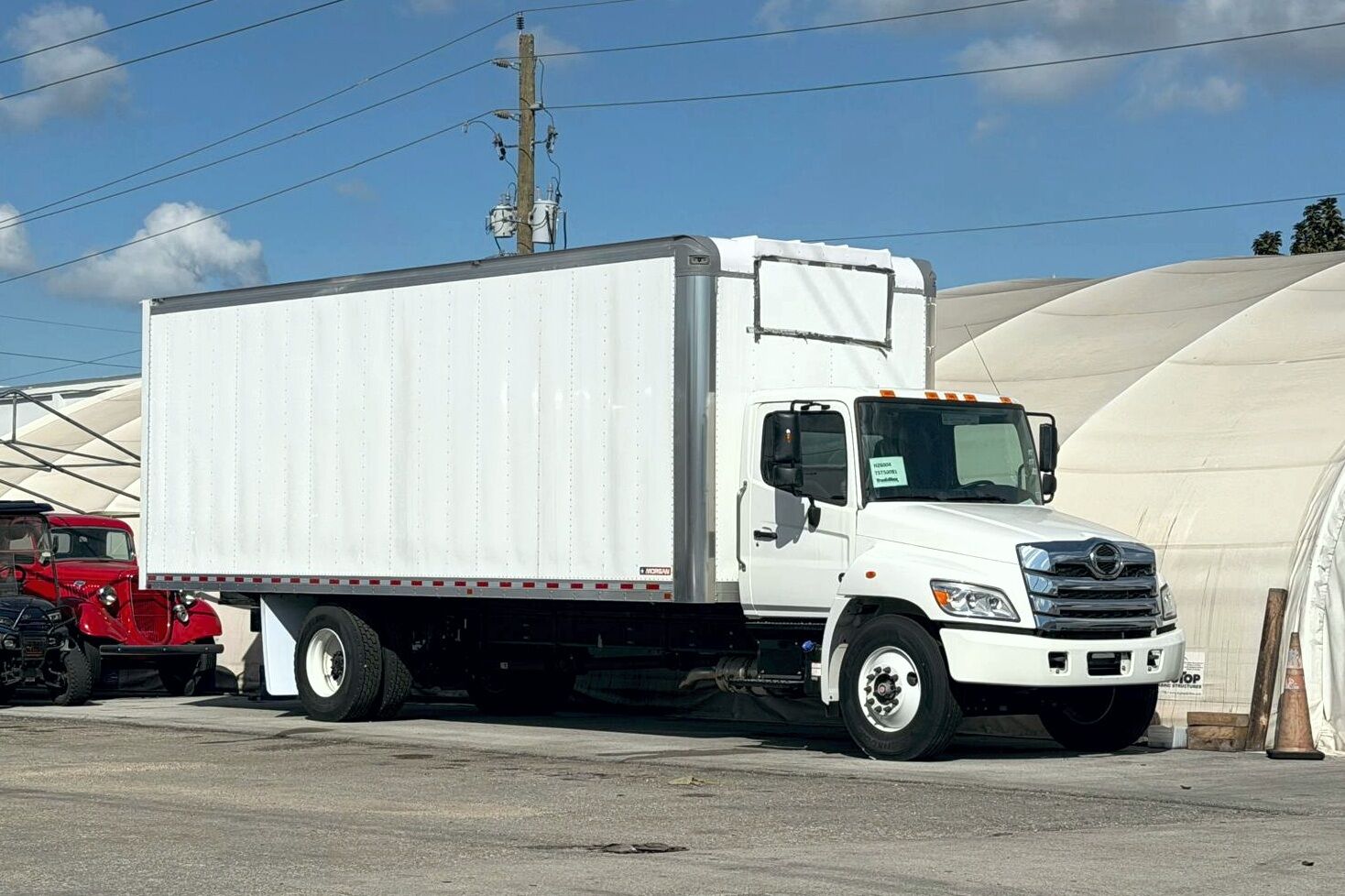 An exterior side view of a refrigerated truck