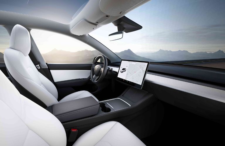 interior steering and dashboard of a Tesla car