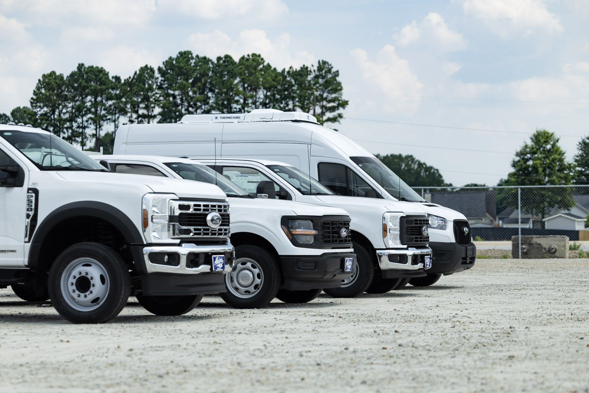 Ford vehicles parked at Akins Ford