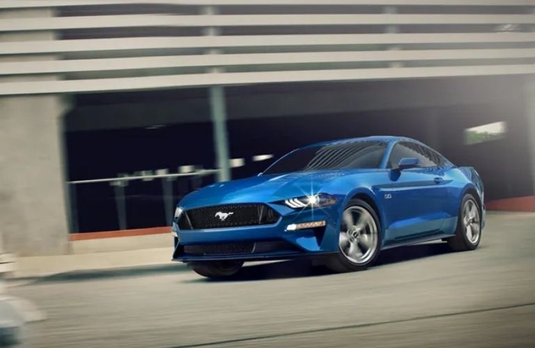 Ford Mustang near a building