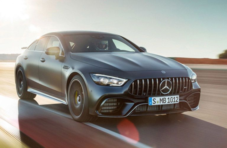2019 Mercedes-Benz AMG GT driving fast on the race track on a sunny day