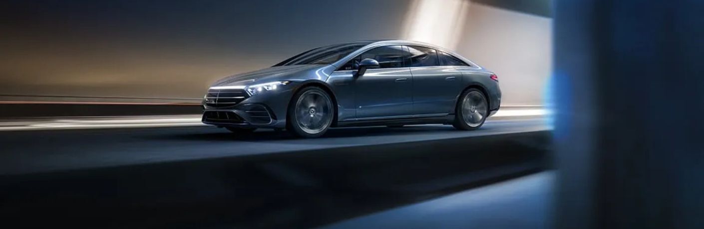 2026 Mercedes-Benz EQS car driving on a road