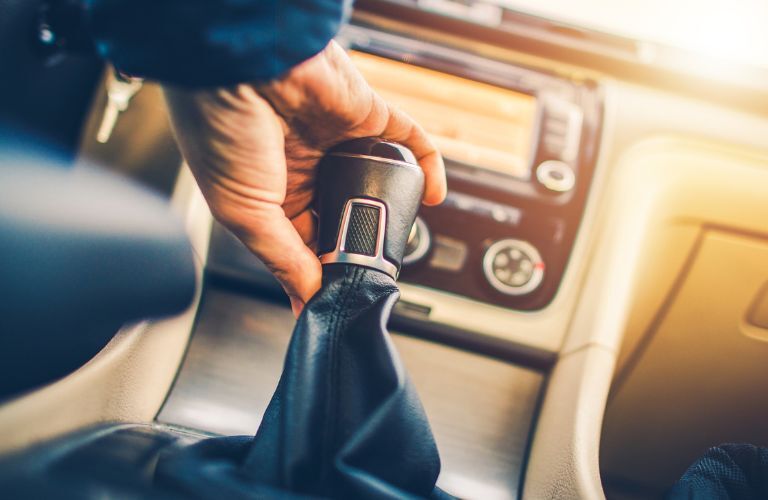 Man using a transmission in a car